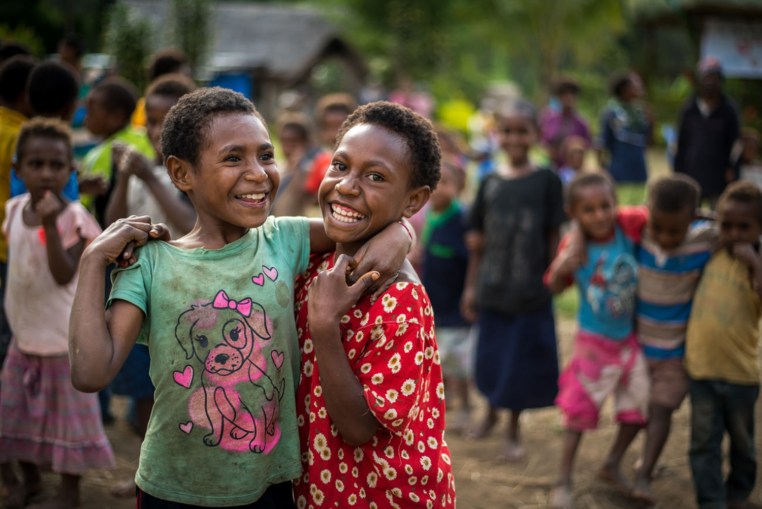 Saviza Community. Henganofi District, EHP. February 2017. Portrait of two young girls at a community meeting. An evaluation team of UNICEF PNG and Government of PNG carrying out evaluation exercises.