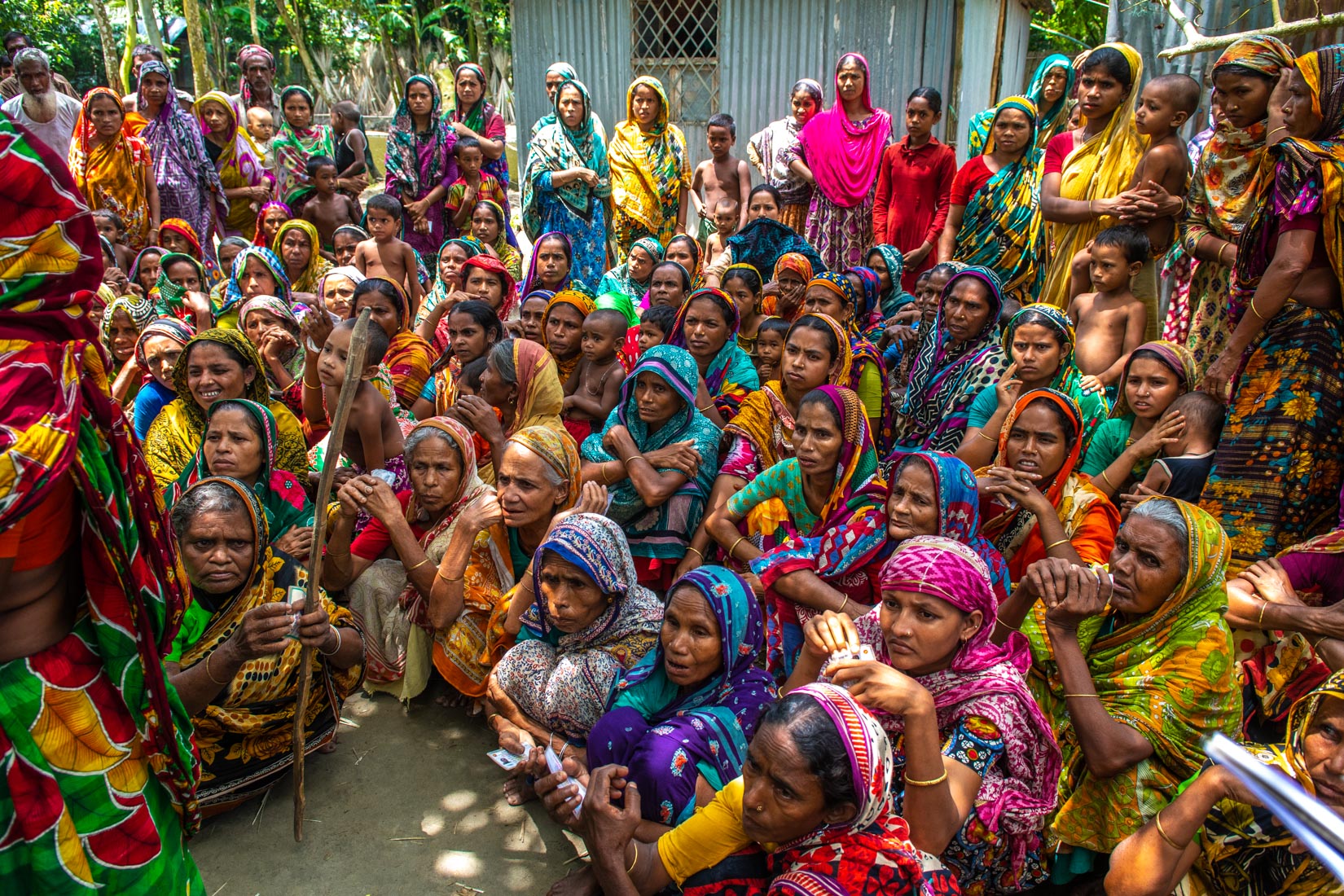 Women affected by flood women gathered at Badsha Miah to be listed for relief and rehabilitation facilities. CBM has been supporting since 2013 to strengthen community resilience and local government for inclusion of disability in Direct Risk and Reduction.