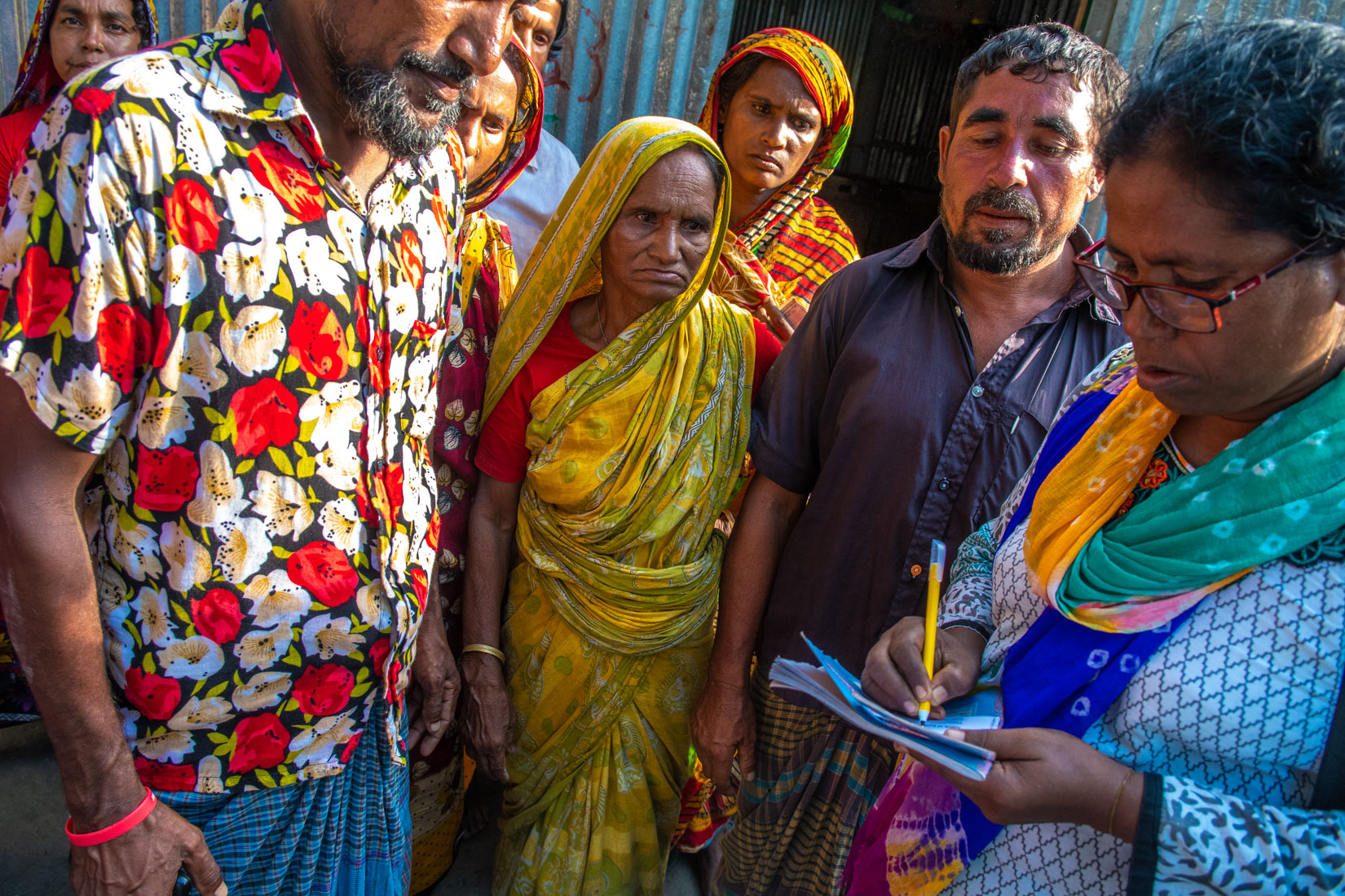 Most. Masura Begum, age 35 of Purbapara is receiving referral slip for relief.